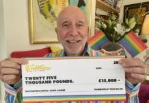 Tom Gattos from The Rainbow Lottery with cheque.