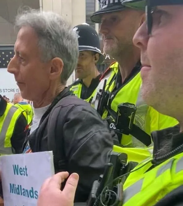 Peter Tatchell being removed by the police from Birmingham Pride March 2025