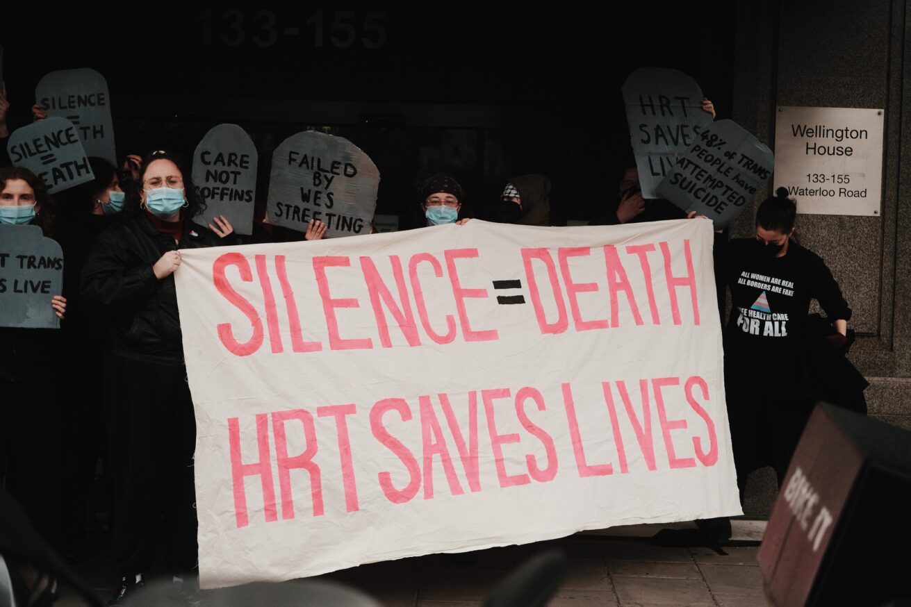 LGBTQ+ and feminist activists shut down NHS England Headquarters protesting rollback of trans healthcare.