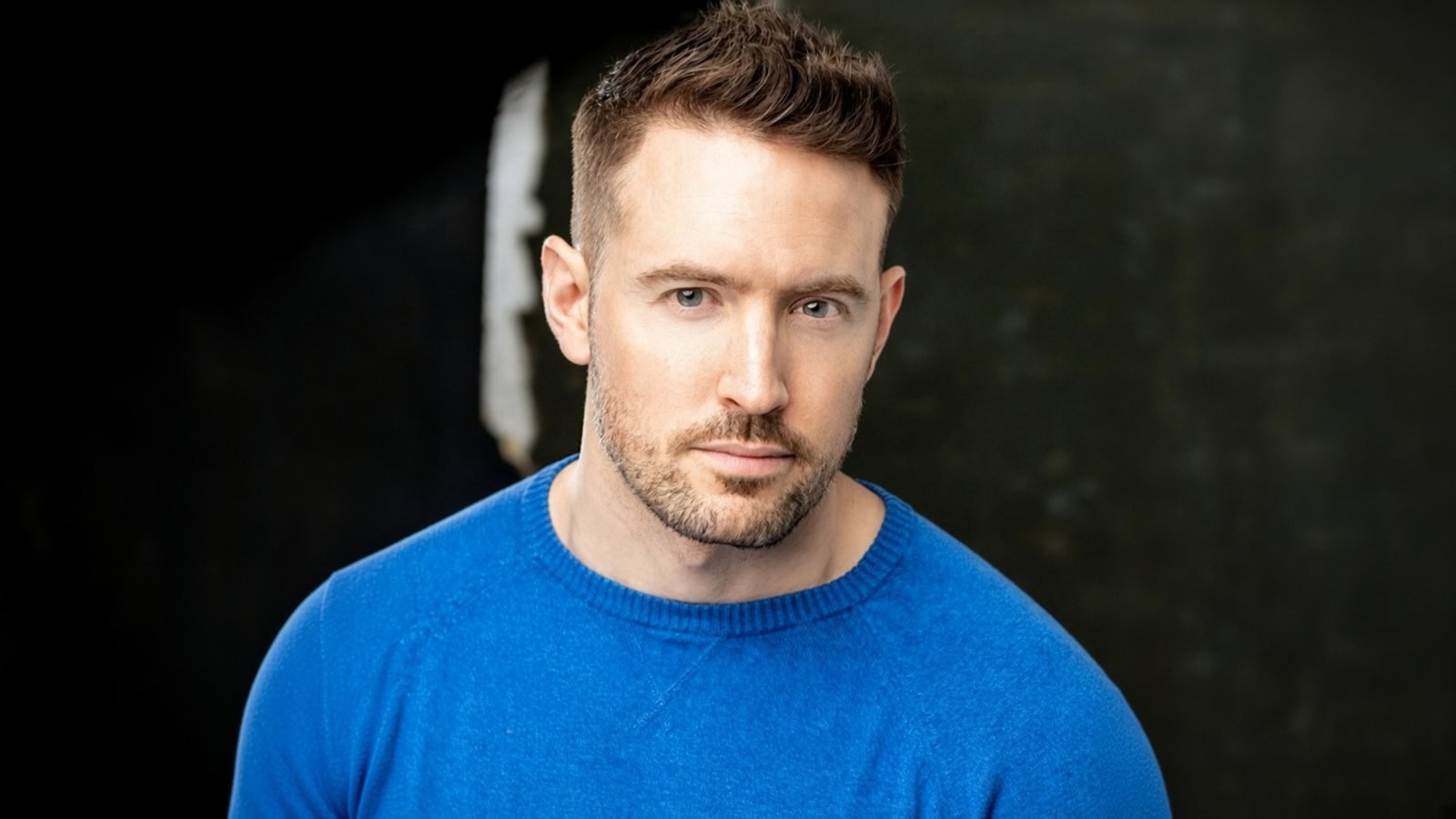 Jerker: QX Meets Paul Denison as He Prepares to Play the Role of JR 